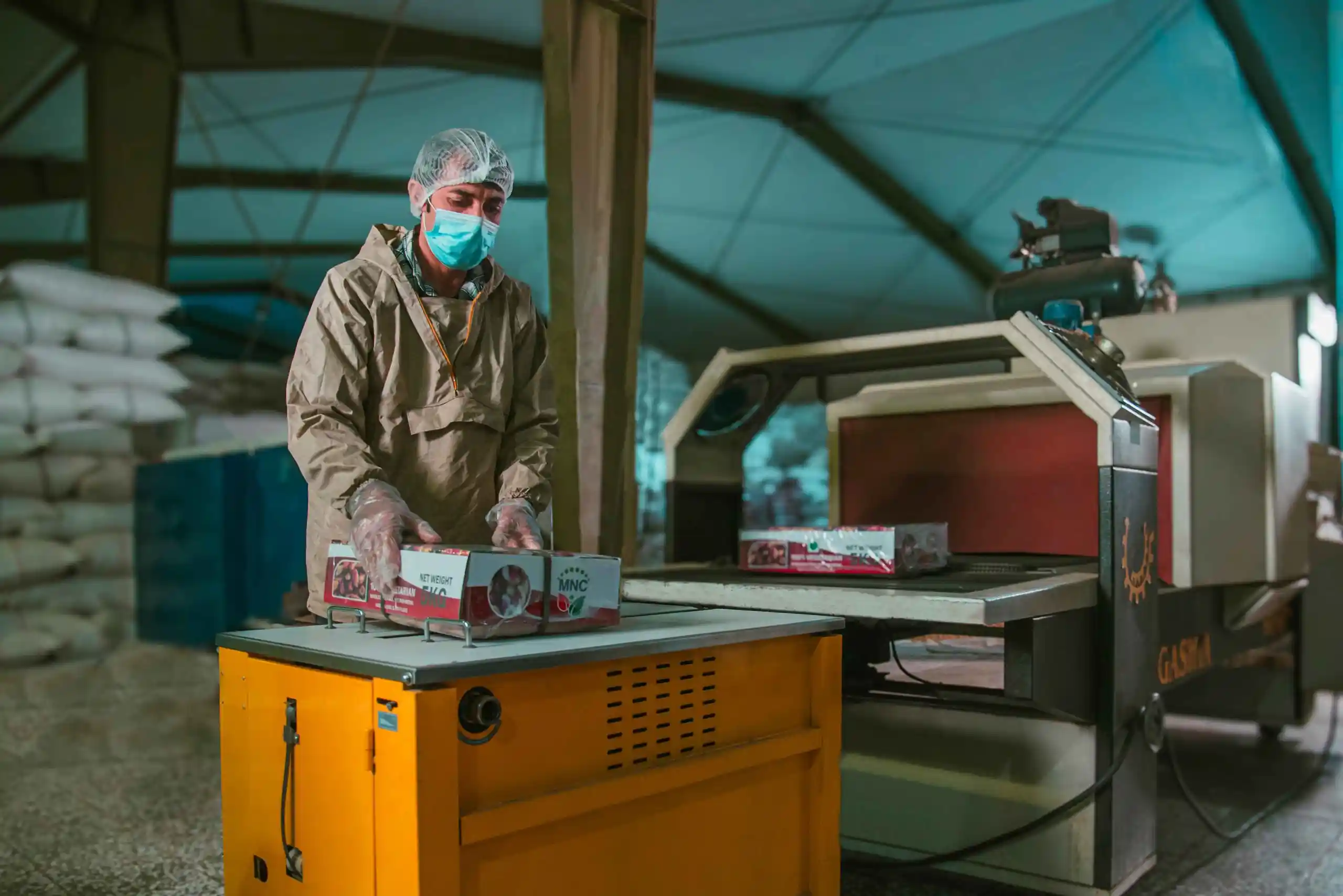 someone packing products at NITC