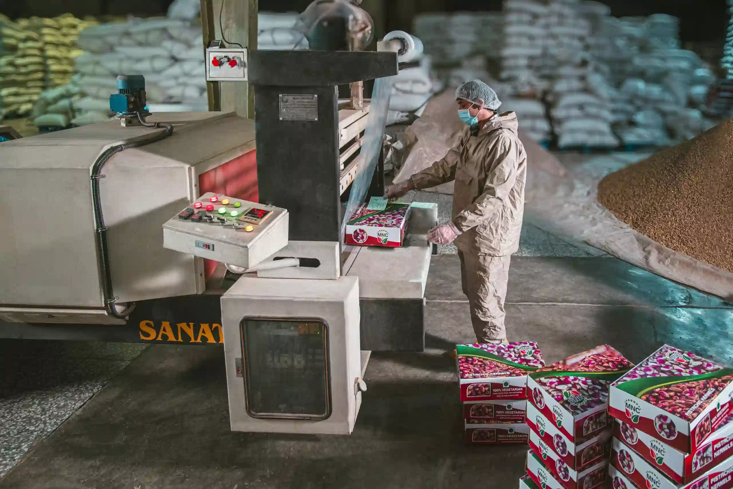 Someone packing nuts in Nazary Company